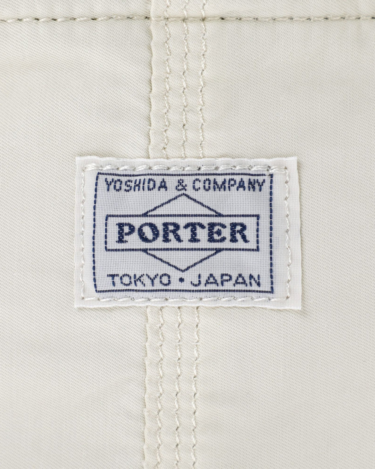 Porter-Yoshida & Co. Mile Vertical Shoulder Bag - White | Porter-Yoshida & Co. Bags | JEANSTORE