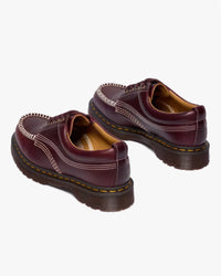 Dr Martens Lowell 4-Eye Moc Toe Shoe - Cherry Red Orleans