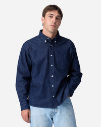 model wearing 3sixteen indigo denim button down shirt