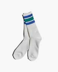 anonymous ism green melange crew socks pair with blue and white stripe detail on white background