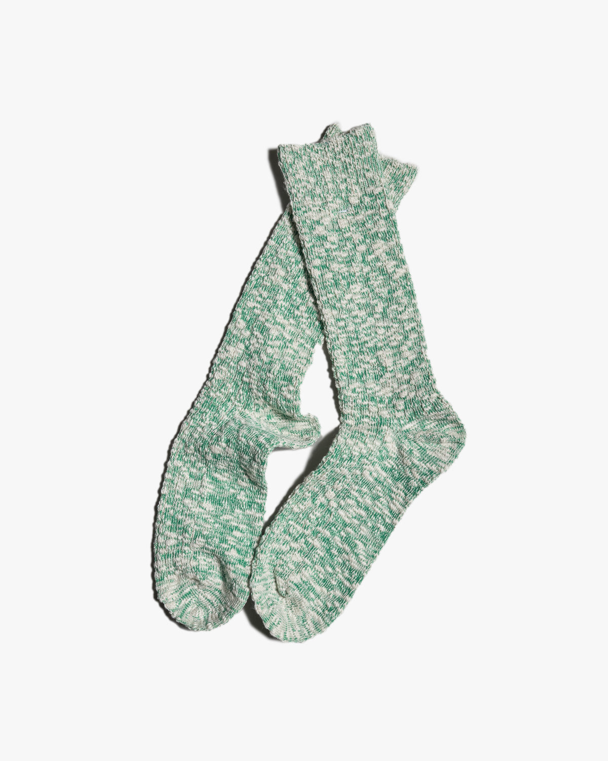 anonymous ism green lightweight slub crew socks pair at an angle