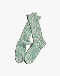 anonymous ism green lightweight slub crew socks pair at an angle