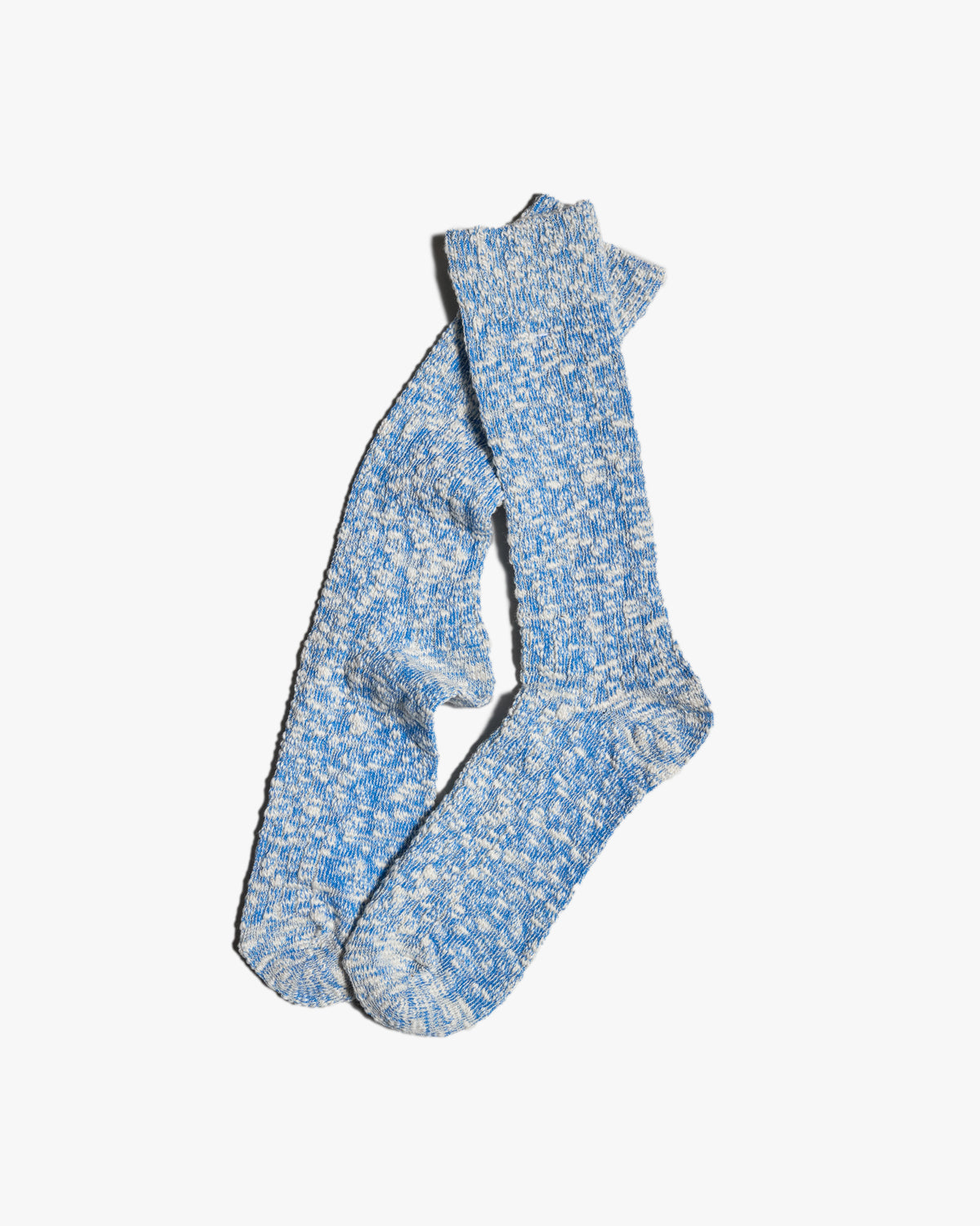 anonymous ism blue lightweight slub crew socks pair at an angle