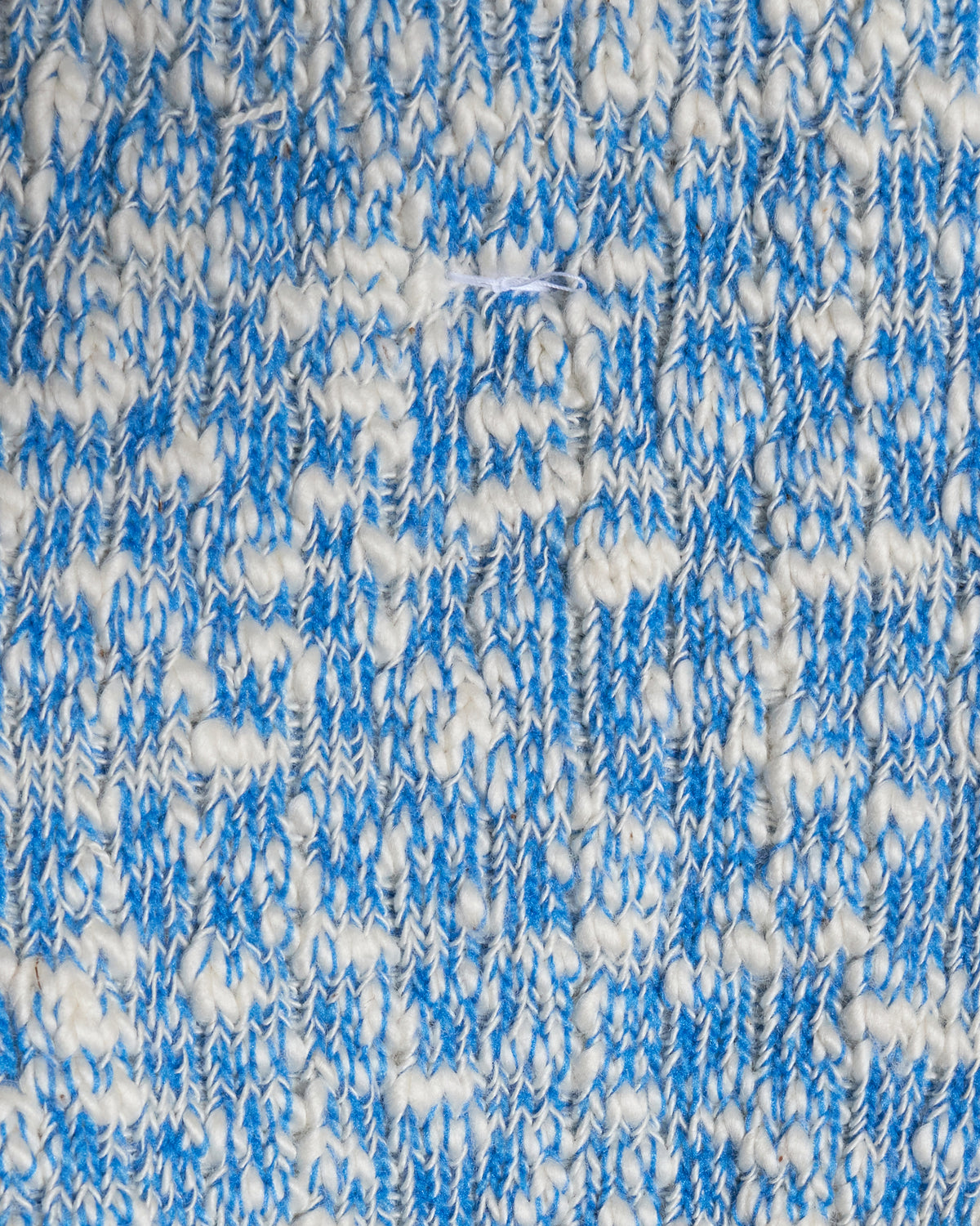 anonymous ism blue slub crew socks close up of knit texture