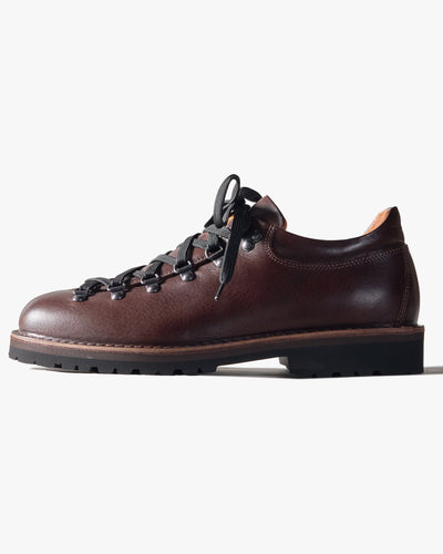 Dark Brown leather Fracap shoe with black laces on a white background