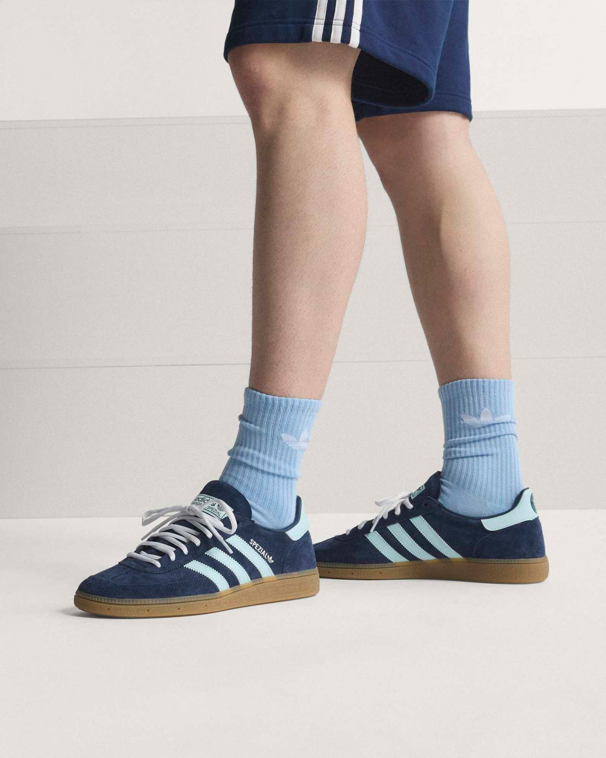 Adidas Handball Spezial Germany Trainers - Collegiate Navy with White Stripes, as modelled, sideview