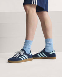 Adidas Handball Spezial Germany Trainers - Collegiate Navy with White Stripes, as modelled, sideview