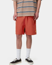 Carhartt WIP Chase Swim Trunks - Oxide Red / Gold | Carhartt WIP Shorts | JEANSTORE
