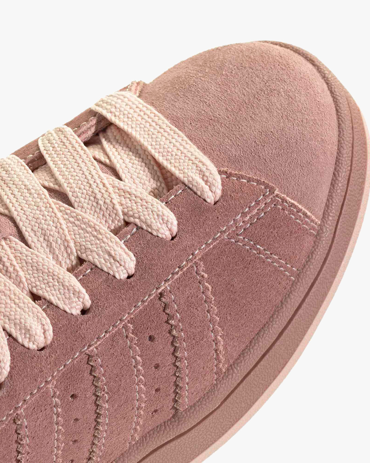 adidas campus 00s blush pink suede trainers top view showing laces and texture