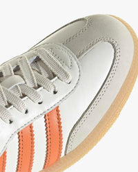 adidas womens samba og trainers white leather upper with orange stripes top view