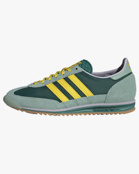 adidas womens sl72 og trainers green with yellow stripes side view on white background