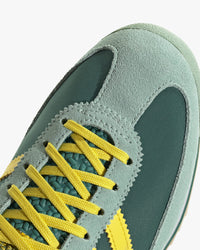 adidas womens sl72 og trainers green upper with yellow stripes top view