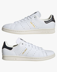 adidas stan smith trainers white and green pair viewed together