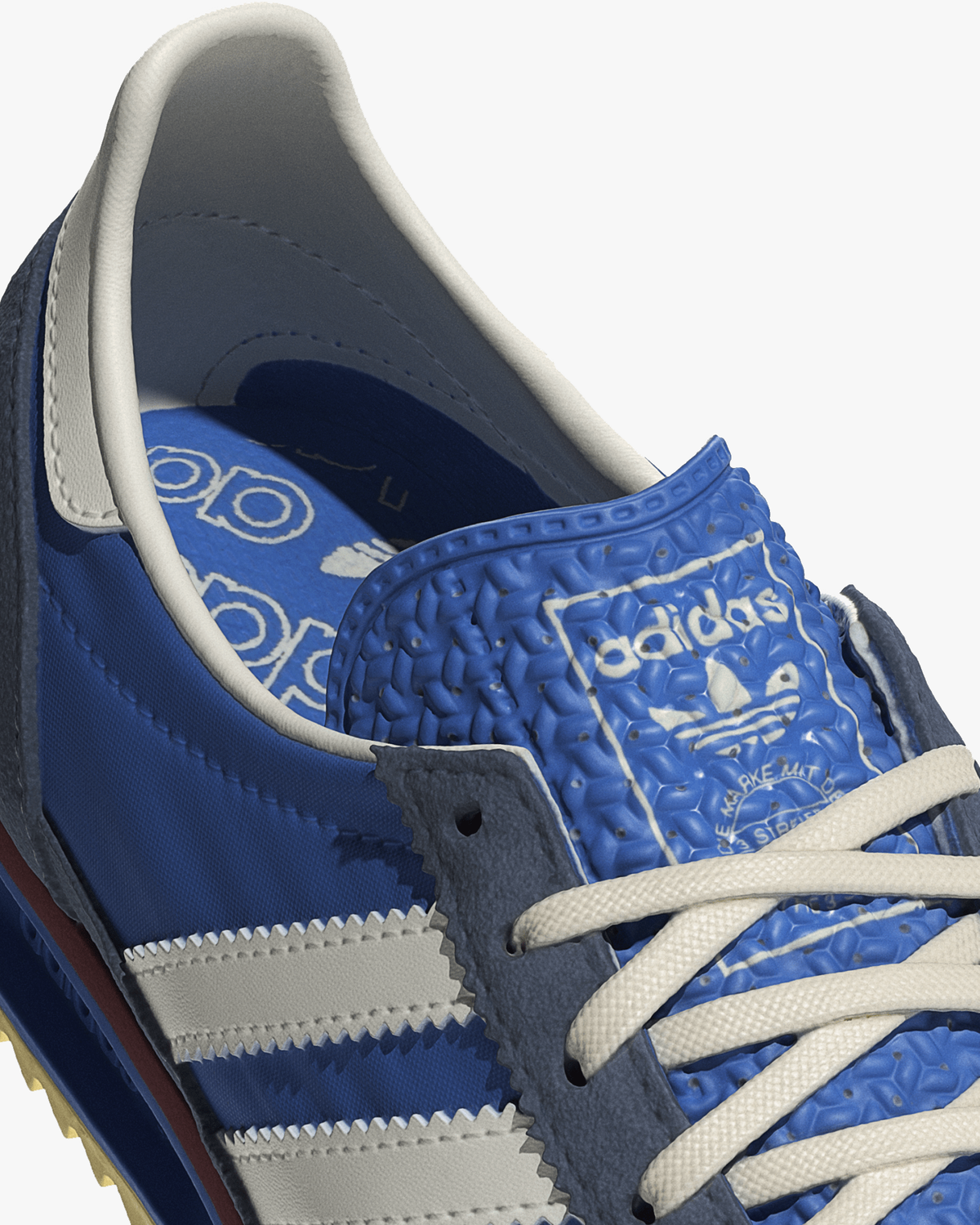 adidas womens sl72 og trainers blue and navy suede overlay detail at an angle