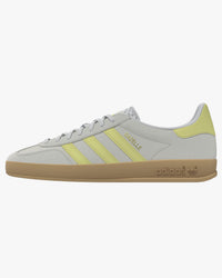 adidas gazelle indoor trainers grey with yellow stripes and gum sole side view w white background