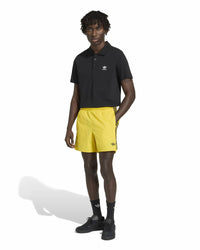 adidas sprinter shorts yellow worn on model full body view