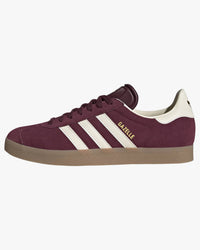 didas gazelle trainers maroon cream white from side against white background