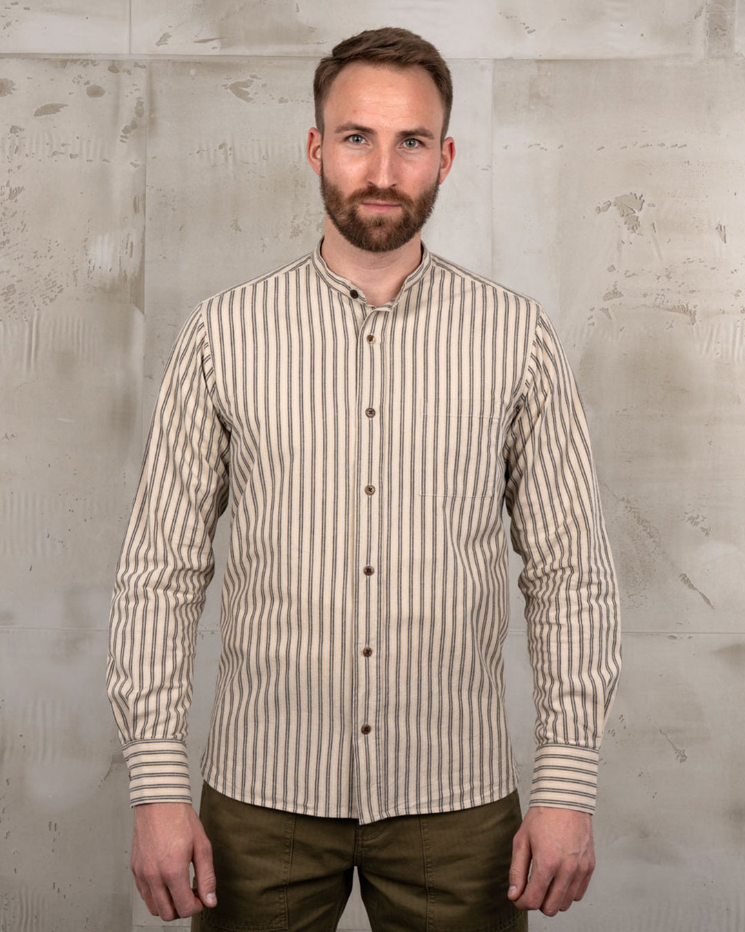model wearing pike brothers band collar shirt grey