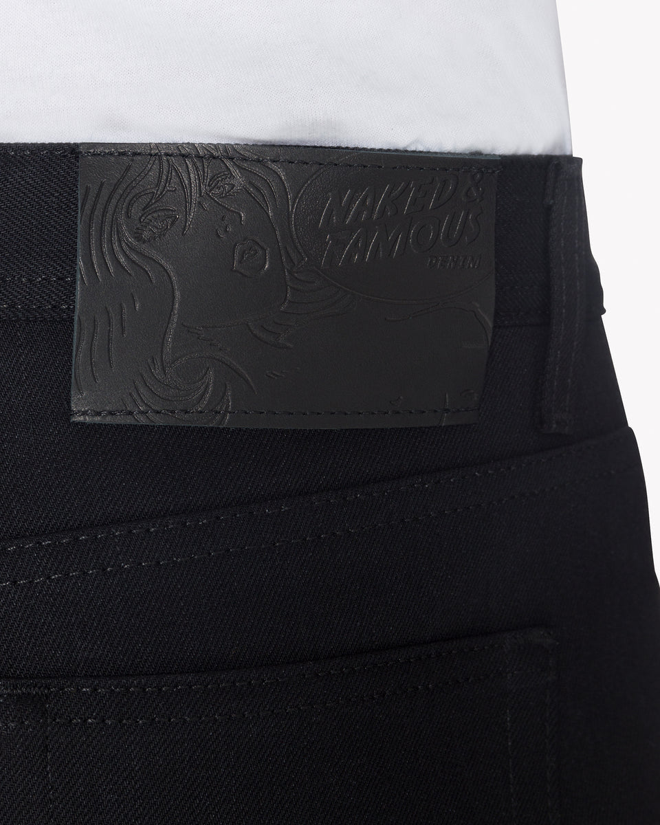 Naked & Famous Denim Weird Guy Regular Tapered Mens Jeans - Solid Black Selvedge | Naked & Famous Denim Jeans | JEANSTORE